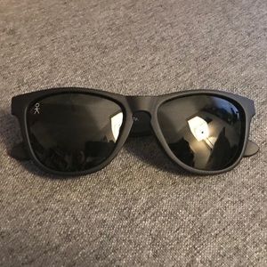 Black sunglasses with polarized black lenses